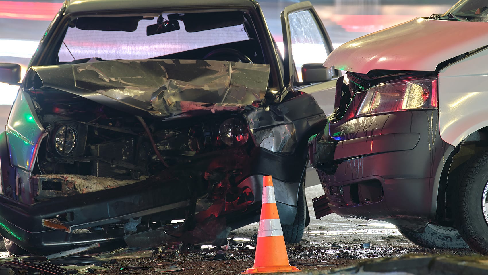 Car accident scene with a work van crashing into a sedan