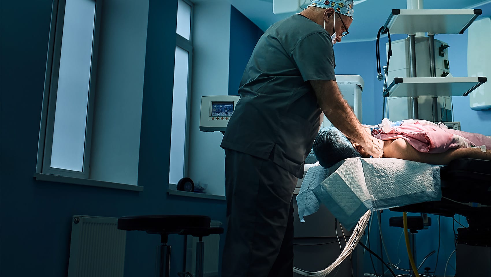 Doctor in operating room with patient