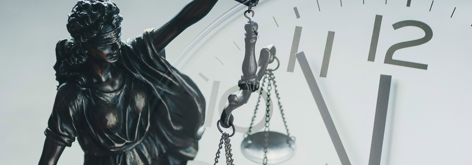 Lady Justice with a clock